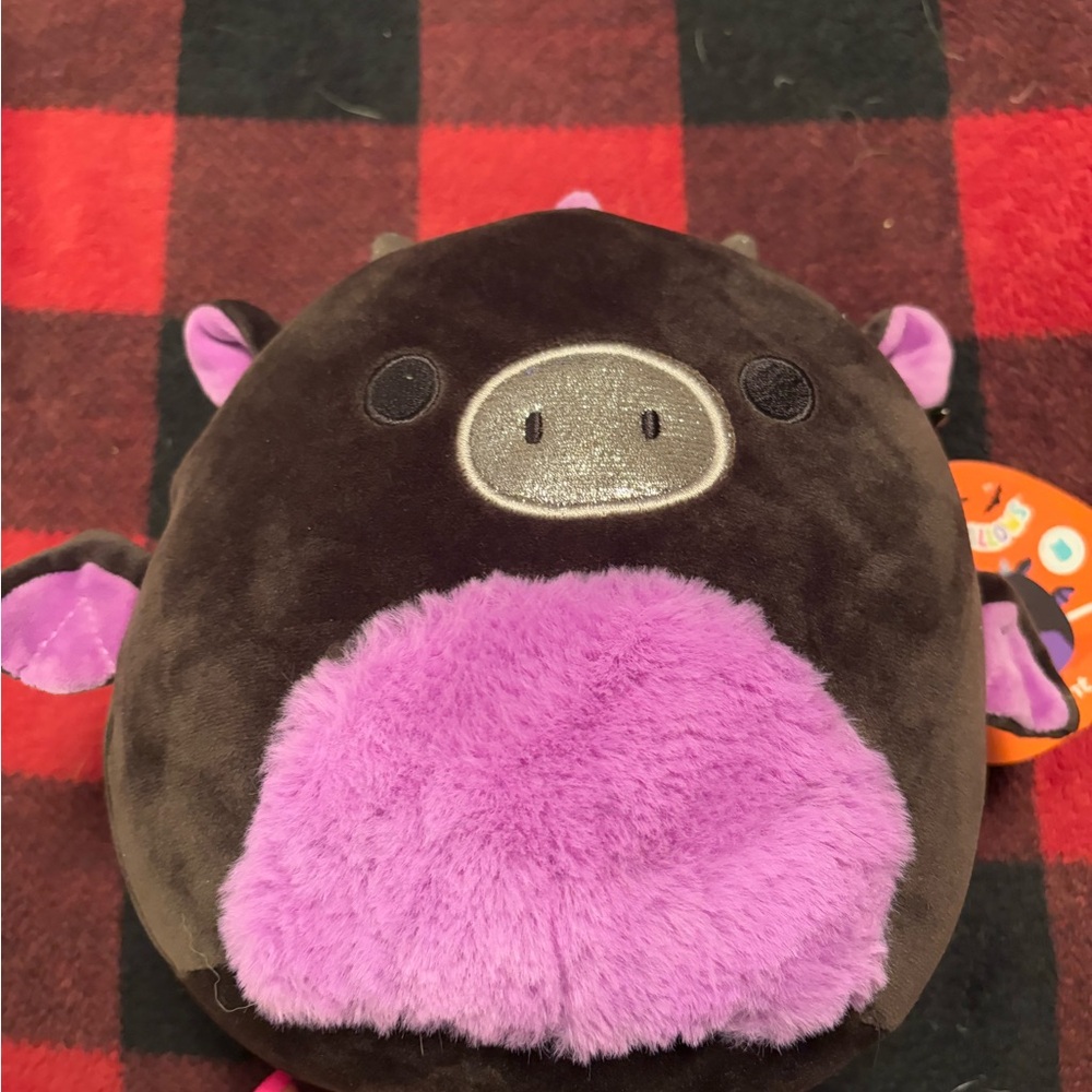 Kellytoy Purple and Black Stuffed Animal with Cuddly Design